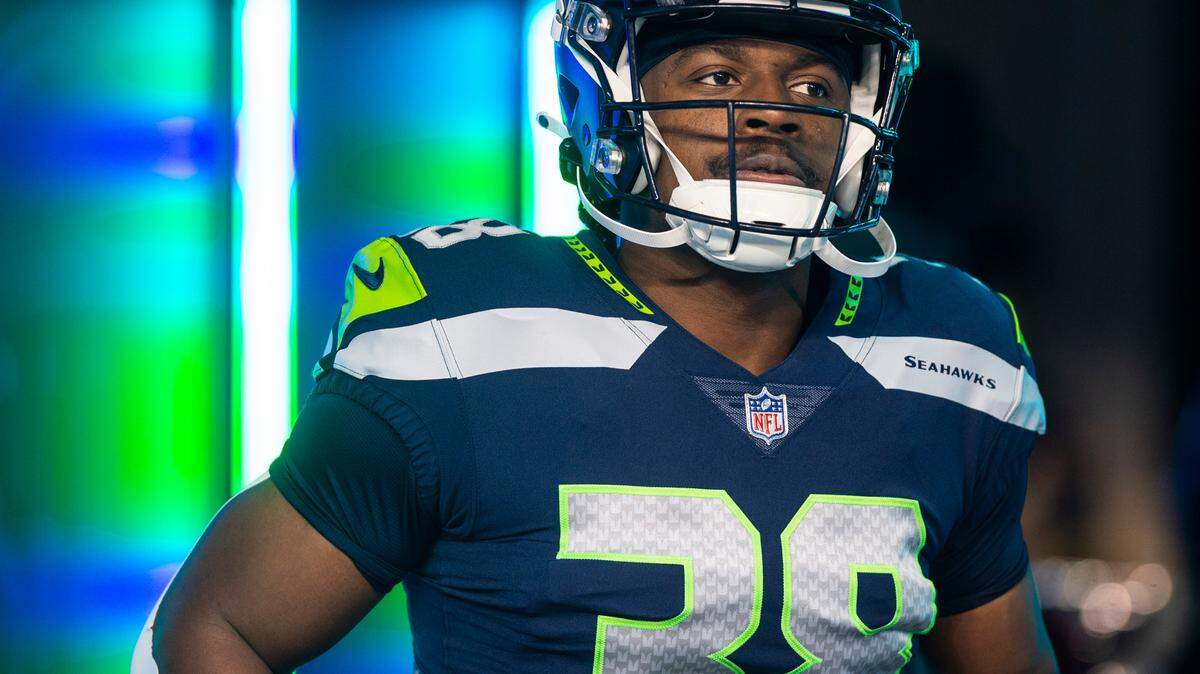 Seattle Seahawks running back Godwin Igwebuike (38) runs out of the tunnel before the start of an NFL game against the California Panthers at Lumen Field in Seattle Wash., on Dec. 11, 2022.