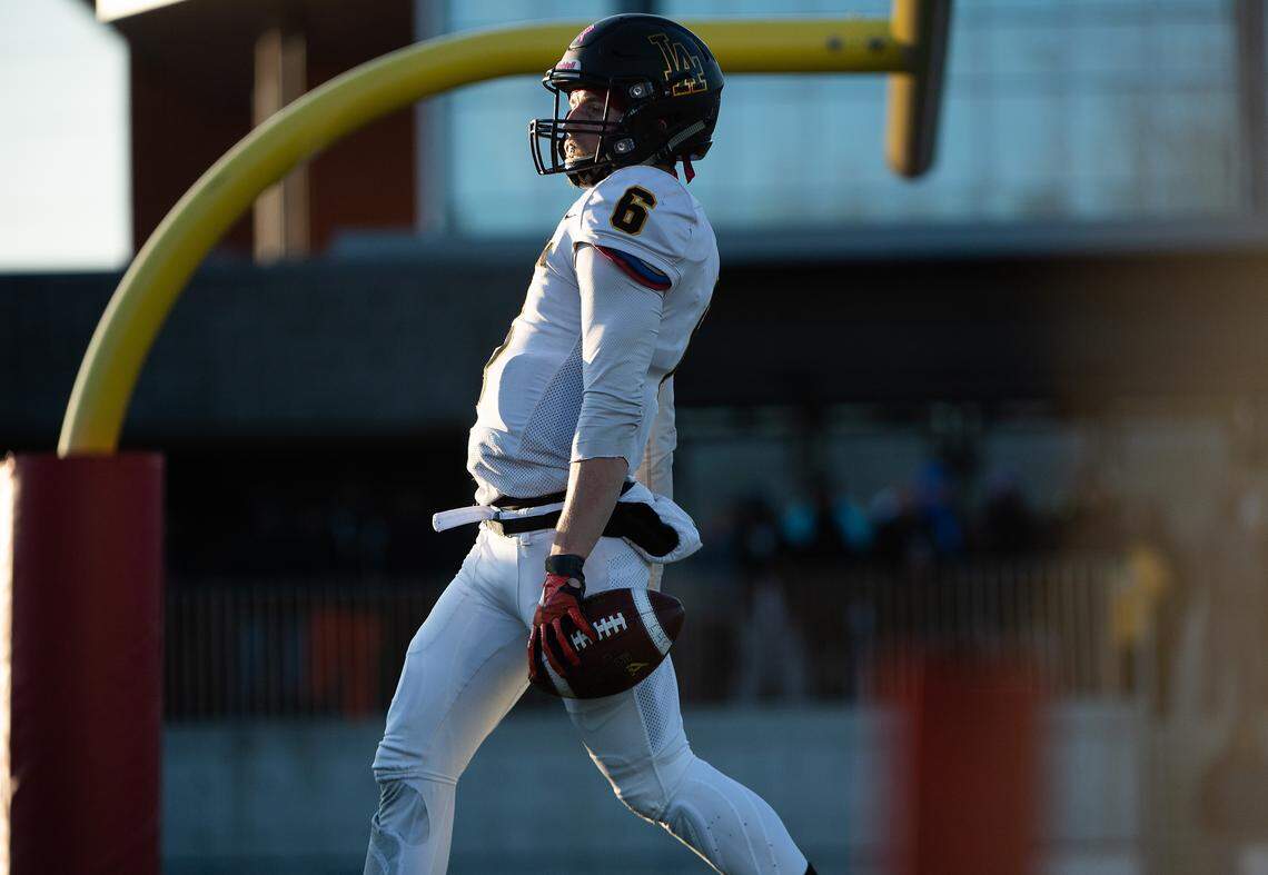 Caden Filer rushes for a touchdown during the fourth quarter. Lincoln played Eastside Catholic in the 3A football semifinal game at Sammamish High School in Bellevue, Wash., on Saturday, Nov. 30, 2019.