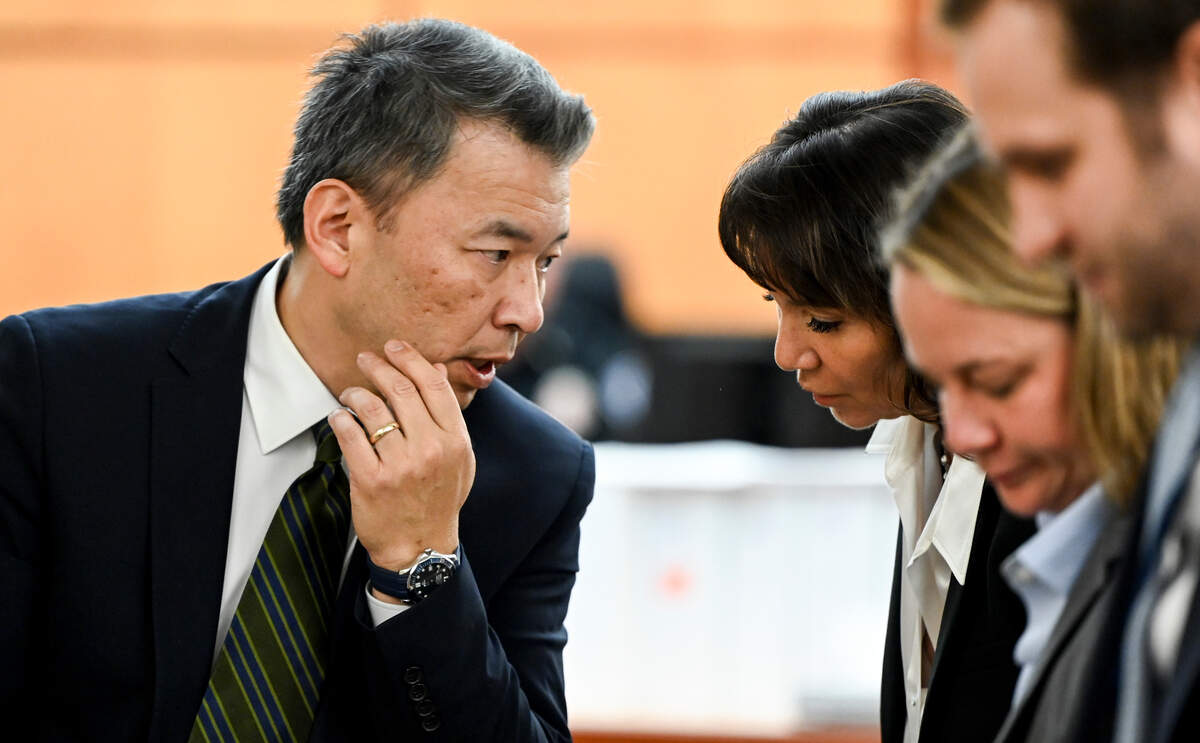 State assistant attorney general Kent Liu (left) and special prosecutor Patty Eakes confer during the trial of three Tacoma police officers in the killing of Manny Ellis at Pierce County Superior Court, Tuesday, Oct. 24, 2023, in Tacoma.