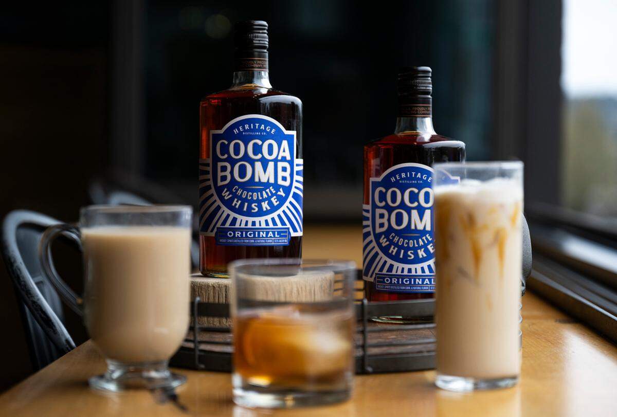 The Cocoa Bomb Chocolate Whiskey, which won “Best American Flavoured Whisky” in the World Whiskies Awards 2025 competition, and an array of cocktails made with the flavored whiskey, at Heritage Distilling Co., on Thursday, March 27, 2025, in Gig Harbor.