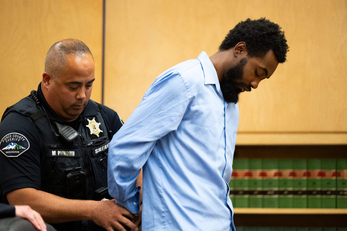 Malik Patterson, 27, is taken into custody after being sentenced for second-degree murder in the July 30, 2022 fatal shooting of Ronnal Hines, 39, on Friday, Aug. 9, 2024, in Tacoma, Wash.