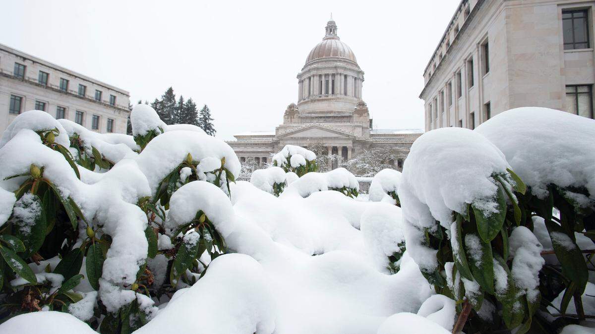 The Washington State Capitol wears a dusting of snow.
