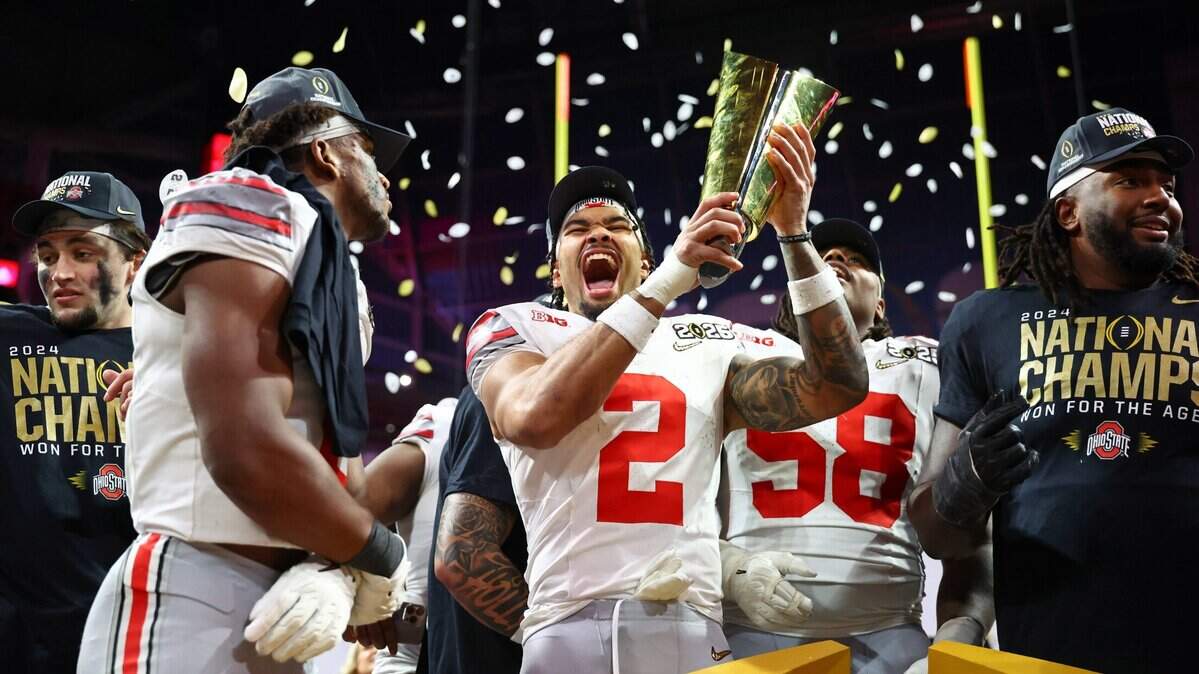Jan 20, 2025; Atlanta, GA, USA; Ohio State Buckeyes wide receiver Emeka Egbuka (2) celebrates after winning against the Notre Dame Fighting Irish in the CFP National Championship college football game at Mercedes-Benz Stadium. Mandatory Credit: Mark J. Rebilas-Imagn Images