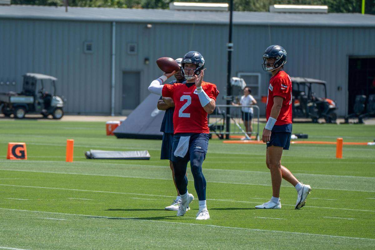 Seattle Seahawks quarterback Drew Lock practices his throws during the first day of training camp at the Virginia Mason Athletic Center on July 27, 2022.