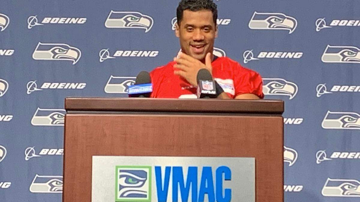 Russell Wilson returns from finger surgery to his weekly place at the podium for the press conference of the Seahawks’ starting quarterback Thursday, Nov. 11, 2021, at the Virginia Mason Athletic Center in Renton.
