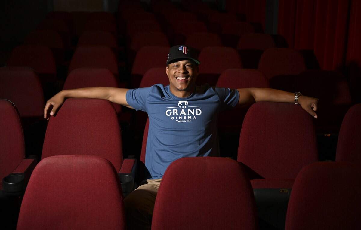 Local filmmaker and Grand Cinema board member Derek Nunn poses for a portrait at The Grand Cinema on Wednesday, June 3, 2026, in Tacoma, Wash. Nunn, who spent 15 years working in the Los Angeles film industry before returning to his hometown, is part of a growing movement of artists expanding the independent filmmaking infrastructure across Tacoma.