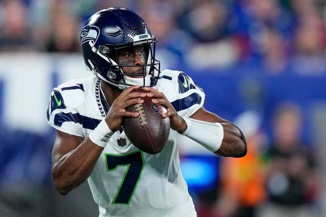 Seattle Seahawks quarterback Geno Smith (7) steps back to pass against the New York Giants during the first quarter of an NFL football game, Monday, Oct. 2, 2023, in East Rutherford, N.J. (AP Photo/Frank Franklin II)
