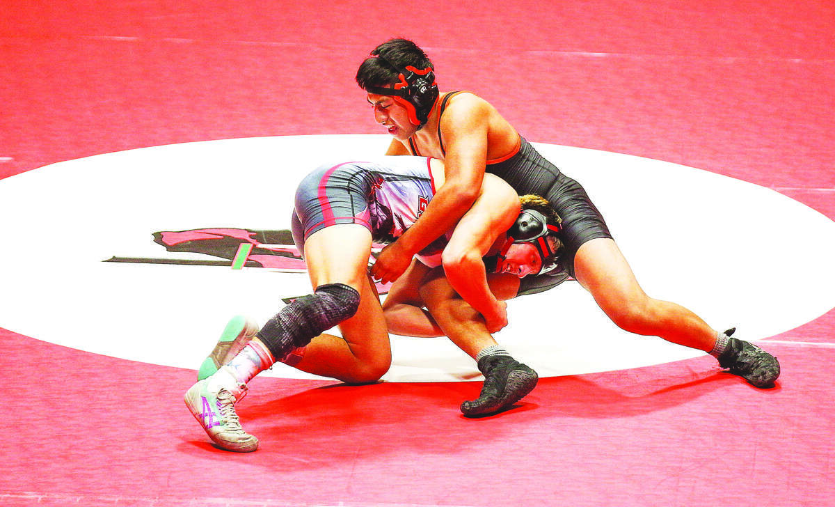 Granger’s Franky Almaguer, left, shoots for a takedown against Zillah’s Ricardo Gomez during a SCAC West dual meet on Thursday, Jan. 24, 2019, in Granger, Wash. (Evan Abell, Yakima Herald-Republic)