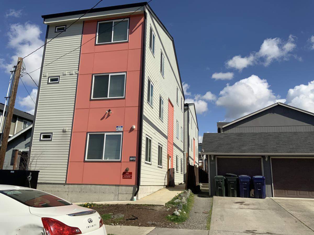 A single-family residential lot next to apartments at 4013 S. Puget Sound Ave., is set to be redeveloped into additional apartments by the same developer.