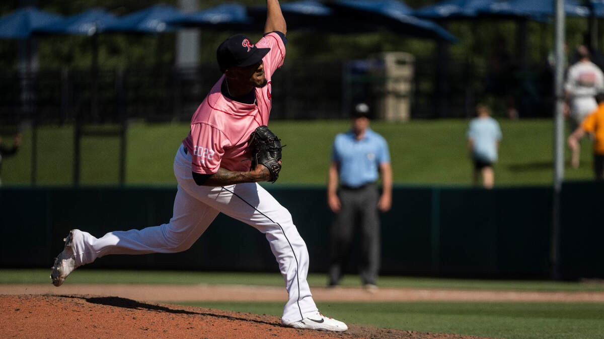Rainiers pitcher Fernando Abad, 45, pitches during the game at Cheney Stadium in Tacoma on Sunday, July 31, 2022.