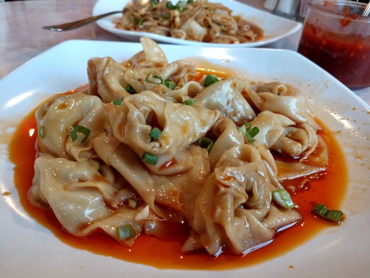 Wonton in hot oil from Rose Garden is on the Taste of China menu at Rose Garden.