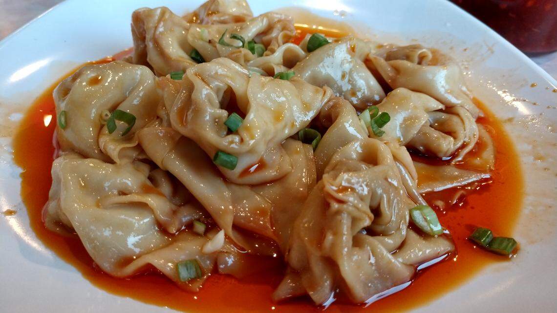 Wonton in hot oil from Rose Garden is on the Taste of China menu at Rose Garden.
