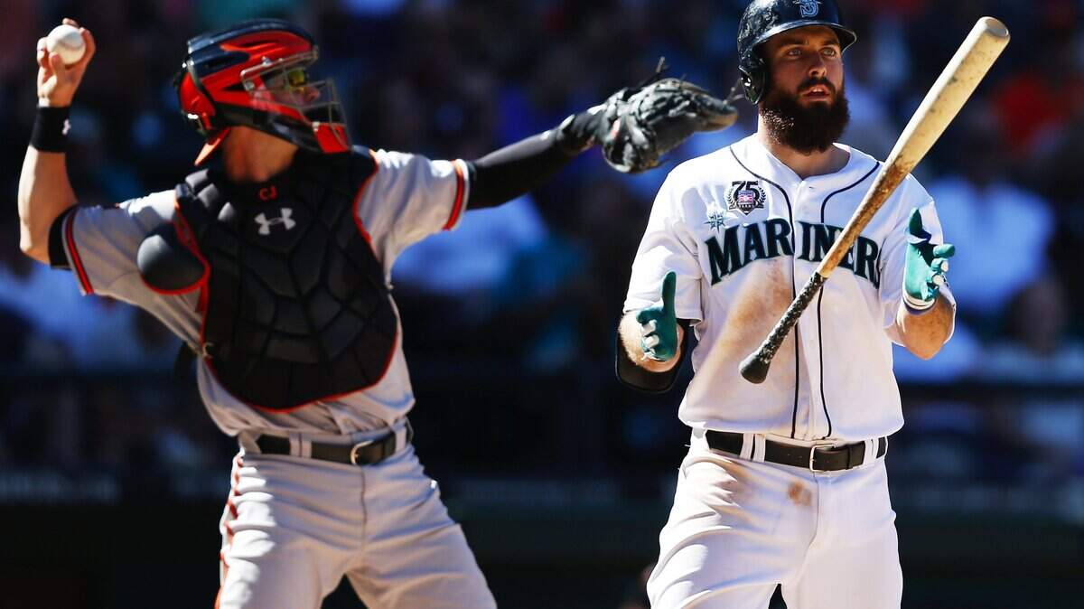 Seattle Mariners left fielder Dustin Ackley (13) throws his bat to the other hand after striking out swinging in the bottom of the ninth inning against the Baltimore Orioles on Sunday, July 27, 2014, at Safeco Field in Seattle, Wash. (Lindsey Wasson/Seattle Times/MCT)