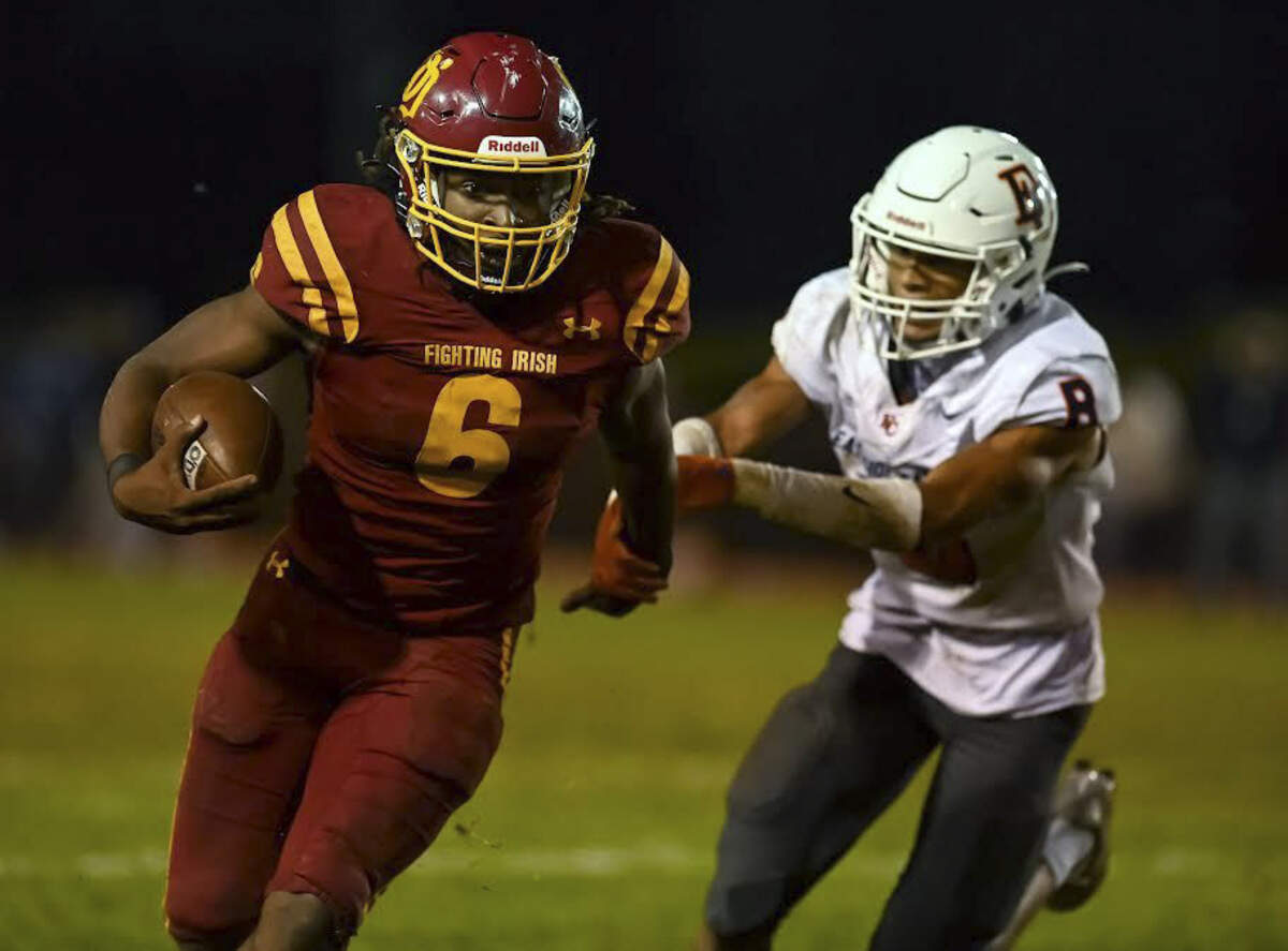 O’Dea High School running back Jason Brown Jr. (6).