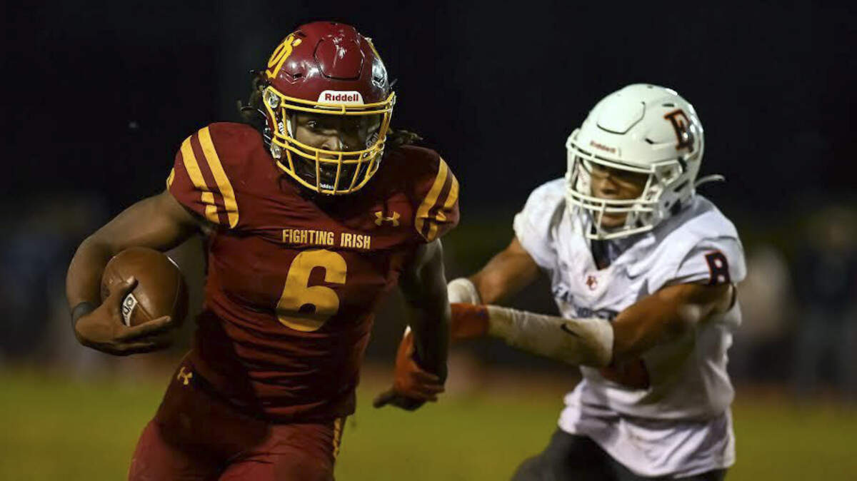 O’Dea High School running back Jason Brown Jr. (6).