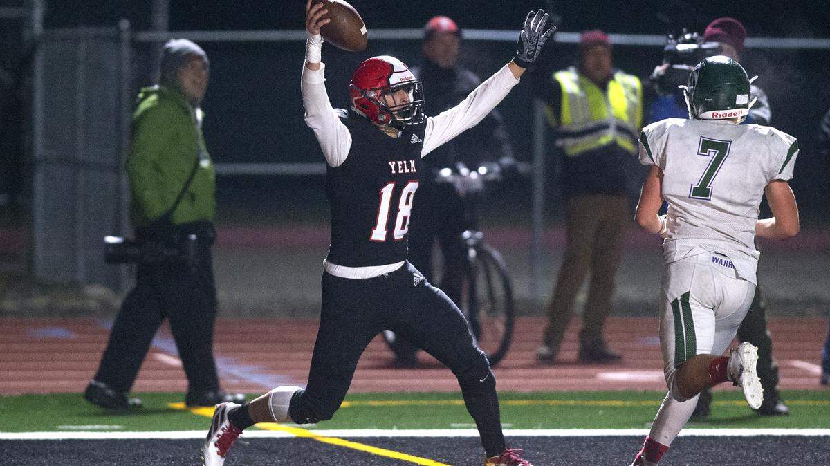 Yelm wide receiver George Packard celebrates an apparent two-point conversion catch during Friday night’s Class 3A playoff football game against Edmonds-Woodway at Yelm High School on Nov. 8, 2019. The play was negated by an illegal block penalty.