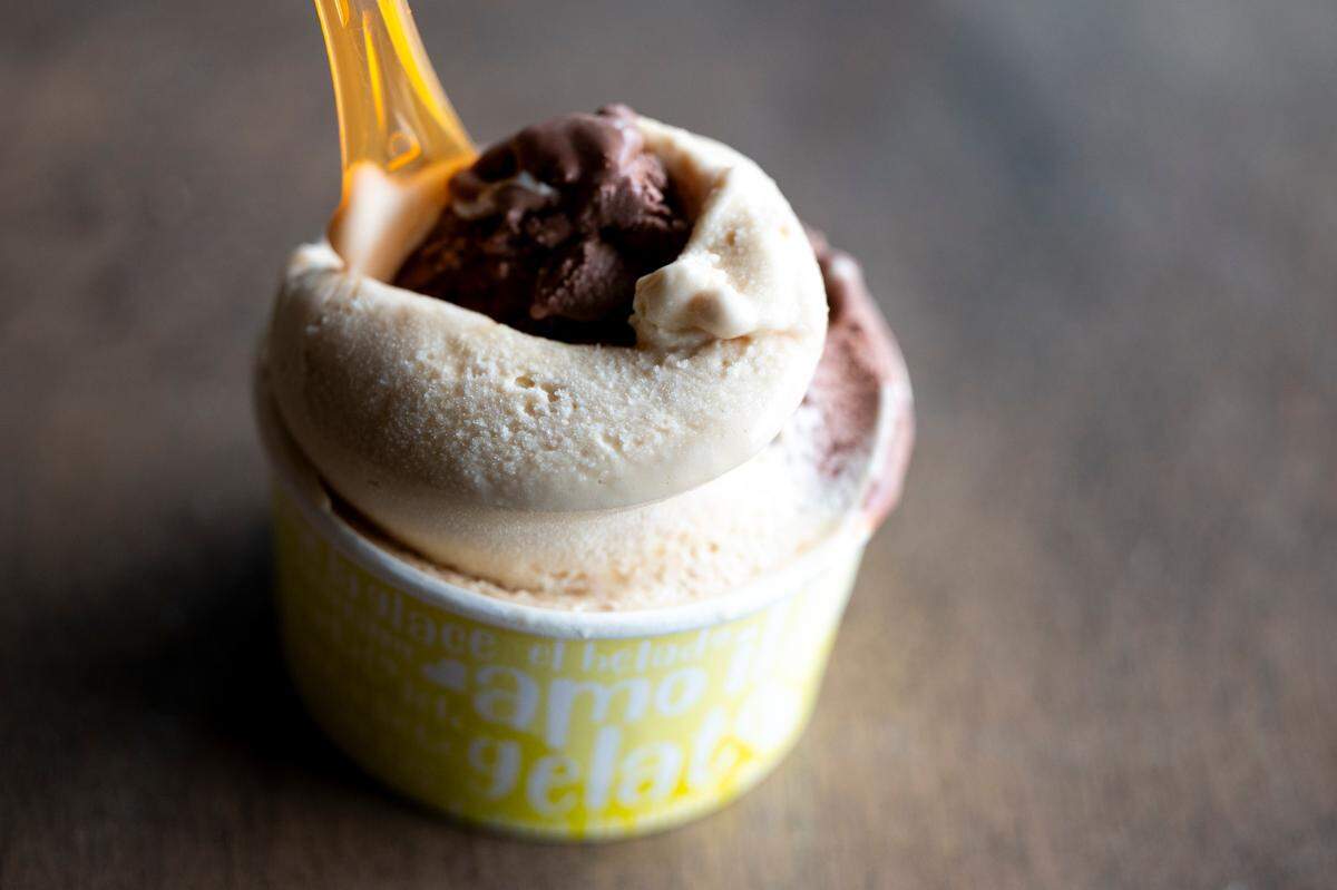 Medzo Gelato makes every batch from-scratch, on-site. Here’s the Grit City Gold, featuring Brown & Haley Almond Rocas, and salted caramel.