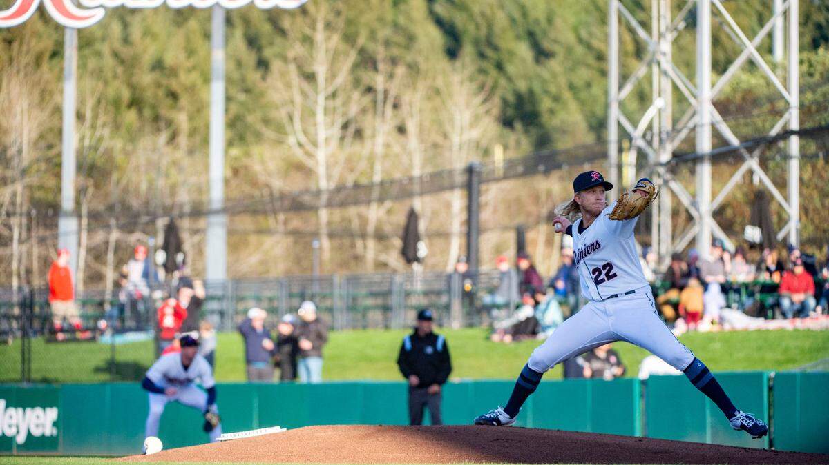 Tacoma Rainiers starter Darren McCaughan (22) delivers a pitch to a Salt Lake Bees Luis Rengifo during the first inning of the season opener at Cheney Stadium in Tacoma on April 5, 2022.