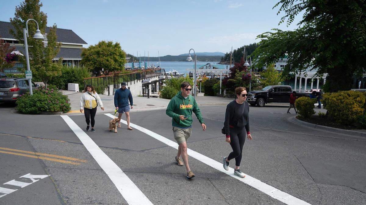 Visitors arrive at Friday Harbor, Washington, on San Juan Island on Monday, June 26, 2023.