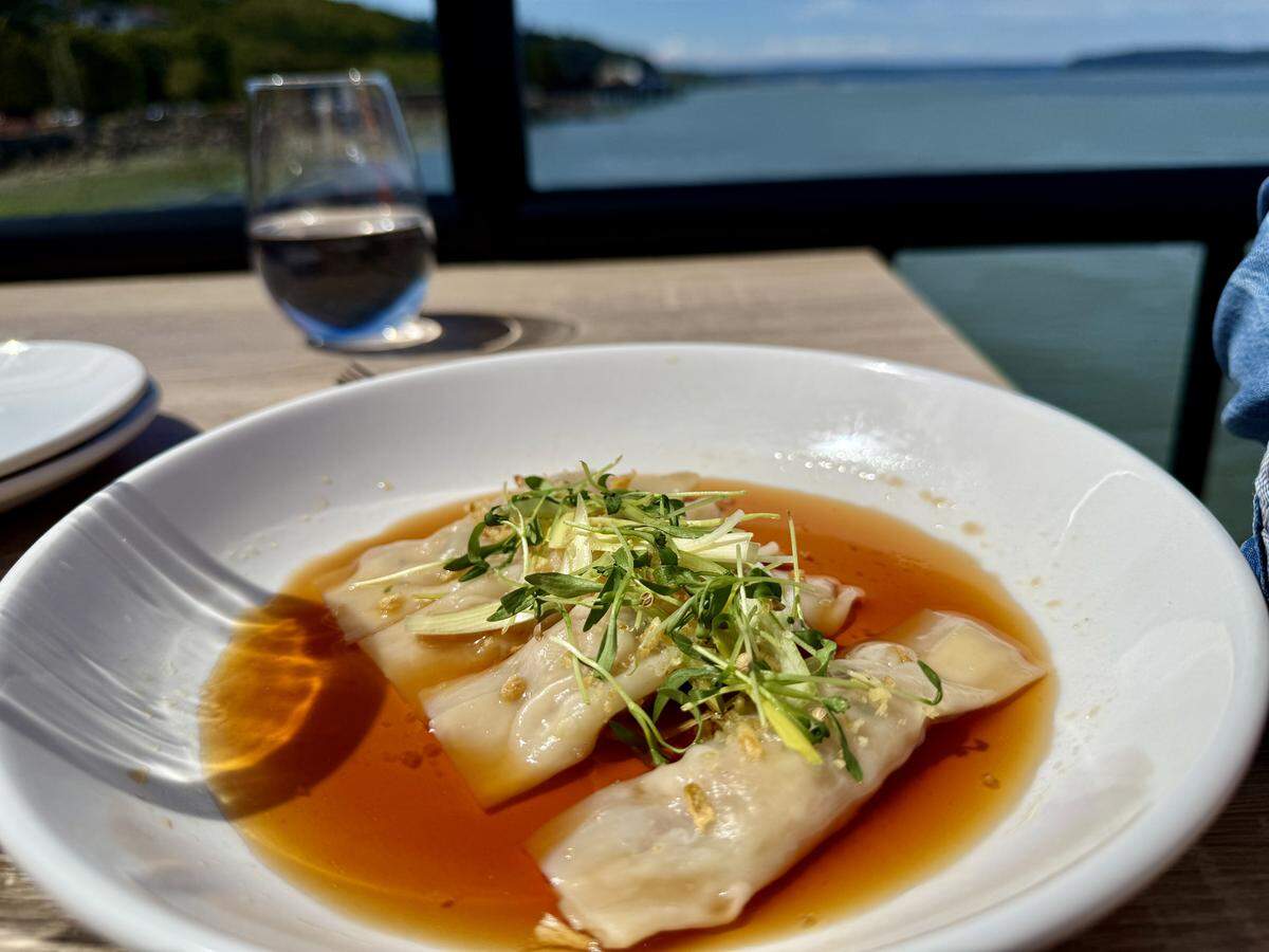Woven Seafood & Chophouse brought a welcome alternative to the traditional waterfront dining experiences on Tacoma’s Ruston Way. Pictured here are the seafood pillows on a sunny day on the deck.
