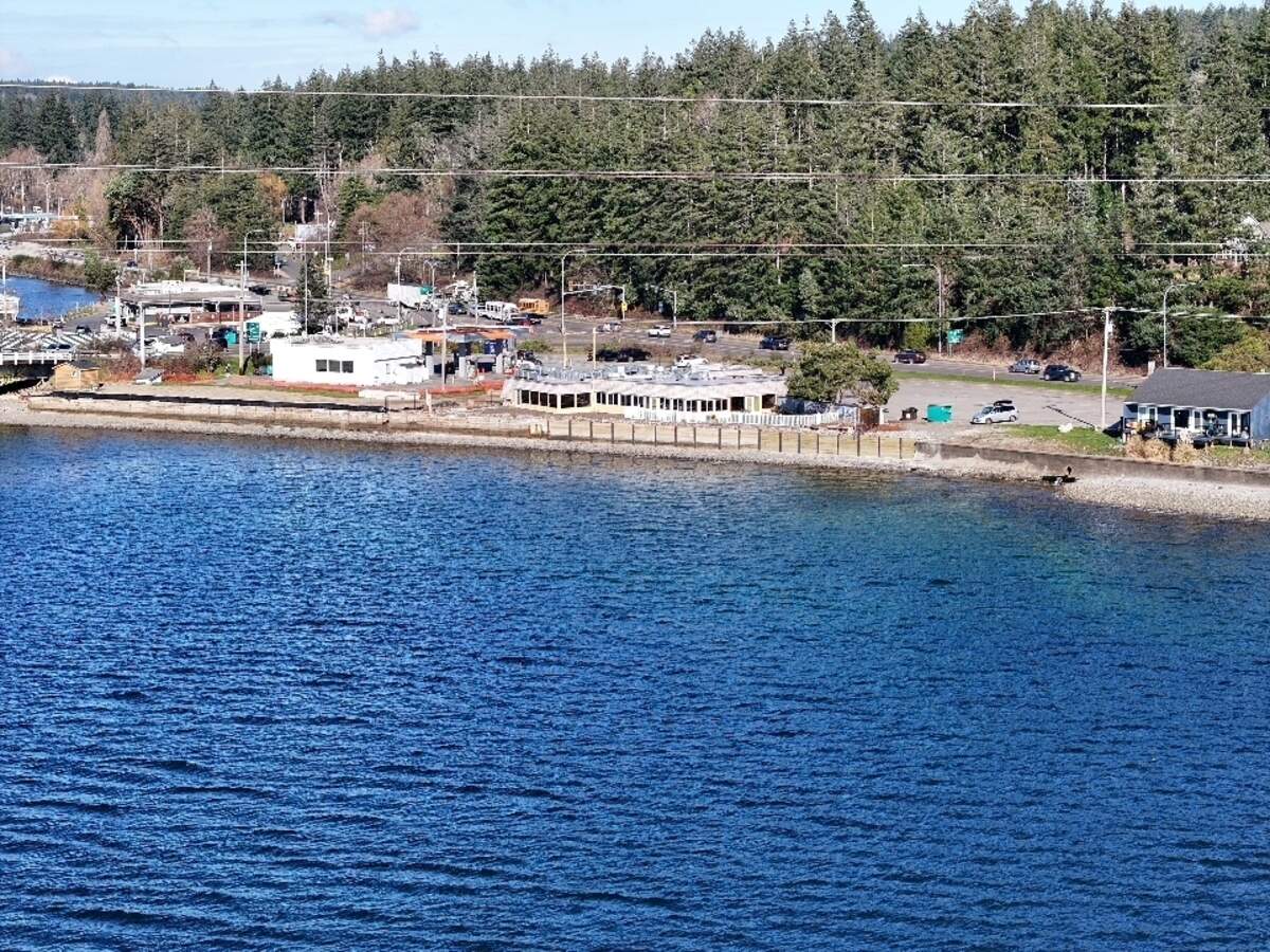 Laguna’s on the Bay, a proposed oyster bar with a seafood retail shop and office space above, will be located near the Purdy Bridge at the site of a former office building. The site, pictured on Thursday, Feb. 12, 2026, will be eligible for sewer service from the city of Gig Harbor after the city council passed an amendment to their municipal code.
