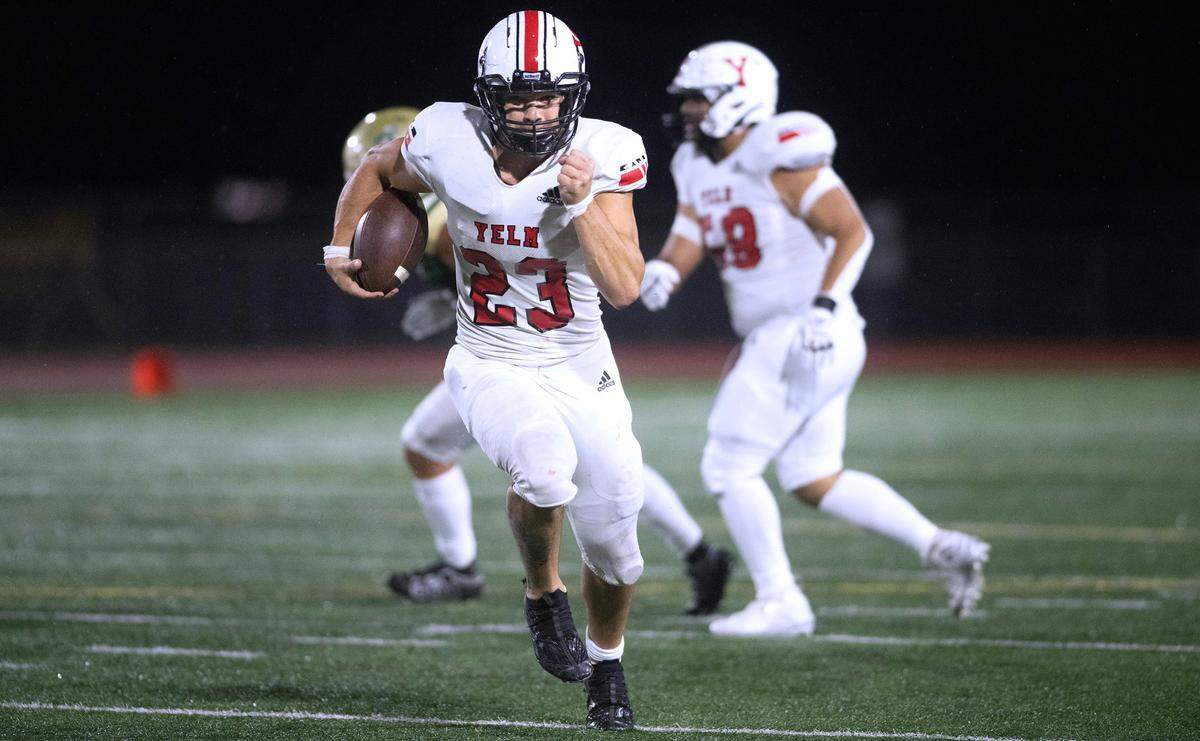 Yelm running back Brayden Platt breaks loose for a touchdown run during Friday night’s 3A SSC football game against the Timberline Blazers at South Sound Stadium in Lacey, Washington, on Oct. 13, 2023. Yelm won the game, 54-7.
