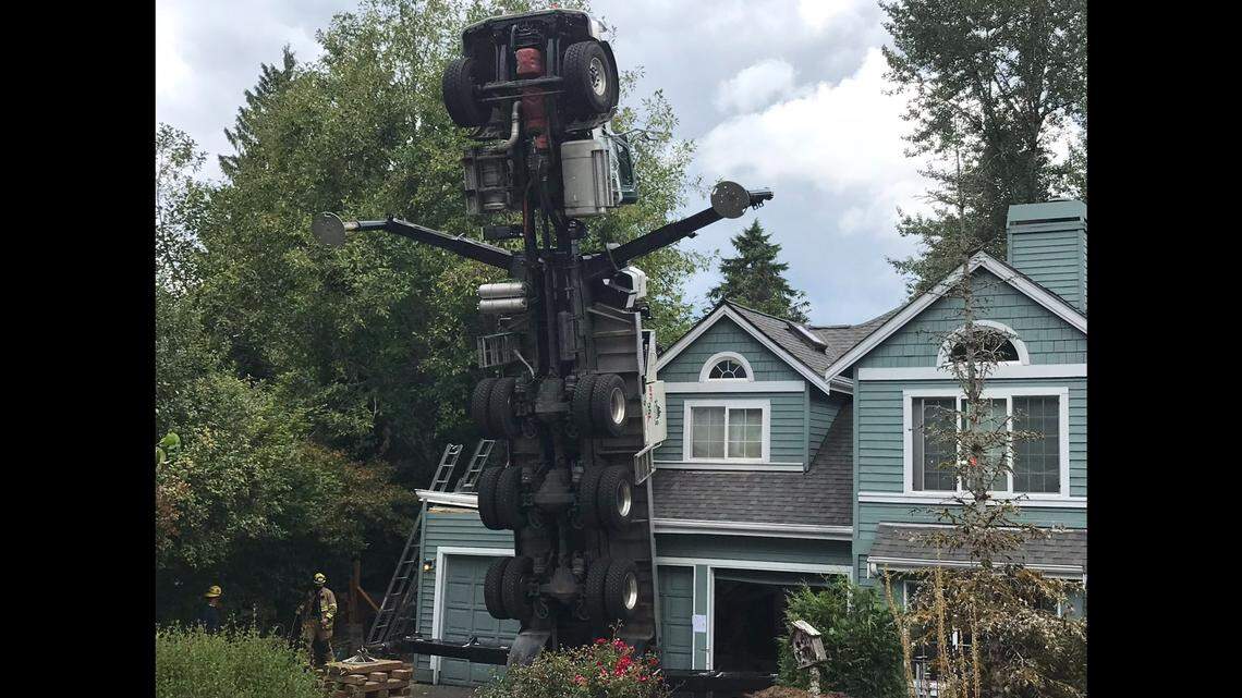 Fire crew from Eastside Fire and Rescue responded to a crane crash Aug. 31, 2021, around noon in Issaquah, Washington. Two workers were injured in the incident, but no one was in the home.