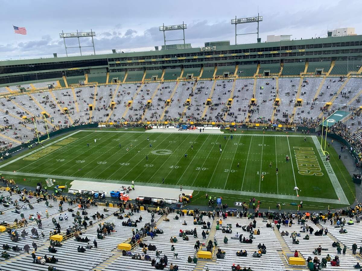 The morning snow ended in Green Bay and the field was covered before the Seahawks played the Packers Sunday, Nov. 14, 2021, at Lambeau Field.