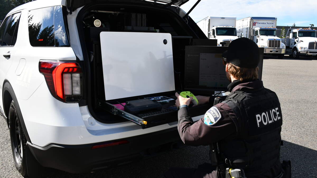 A Gig Harbor Police Department patrol vehicle is equipped to carry the drone and an associated computer monitor, as well as a rapid charging station.