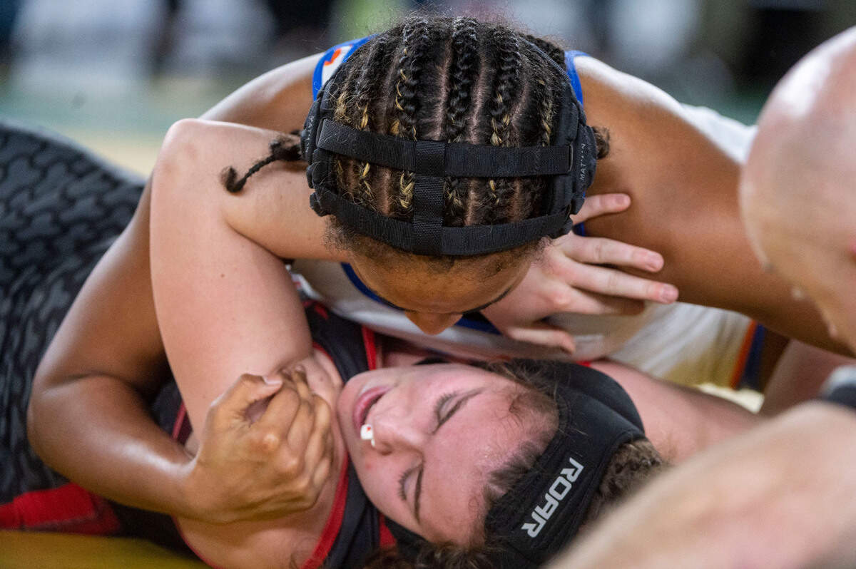 Graham-Kapowsin’s Flor Parker-Borrero pins Camas’ Addie Wunderli in the 140-pound, Girls 3A/4A division’s championship match at Mat Classic XXXIV on Saturday, Feb. 18, 2023, at the Tacoma Dome in Tacoma, Wash. Parker-Borrero, a freshman, pinned Wunderli in 4 minutes, 32 seconds.