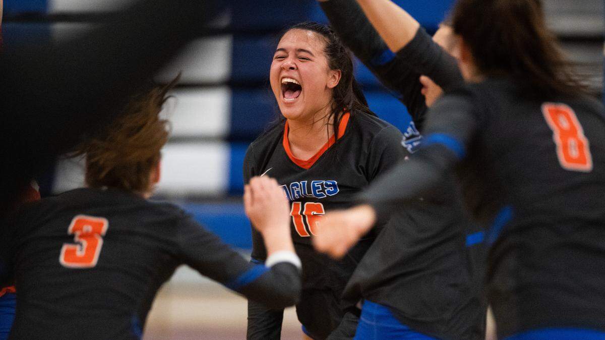 Graham Kapowsin’s Hailey Brockway celebrates a point during the first set. Graham-Kapowsin played Emerald Ridge in the 4A West Central District Final at Curtis High School in Tacoma, Wash., on Saturday, Nov. 16, 2019.
