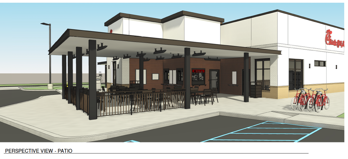 An illustration shows proposed Chick-fil-A drive thru and outdoor seating area for Gig Harbor.