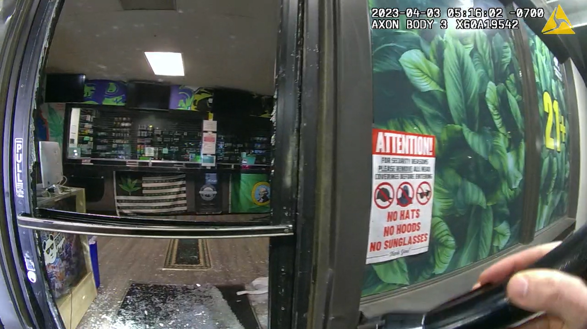 An image from a Pierce County sheriff’s deputy’s body-worn camera shows the front door of a cannabis dispensary that was broken during a burglary Monday, April 4, 2023, at the business near Tacoma.