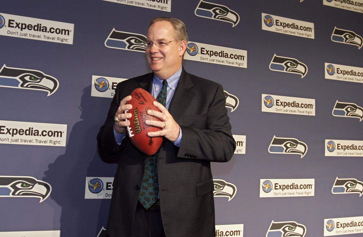 Tim Ruskell holds a football after the Seattle Seahawks announced at a press conference that he has been named President of Football Operations in Seattle on Wednesday, Feb. 23, 2005. Ruskell replaces Bob Whitsitt.