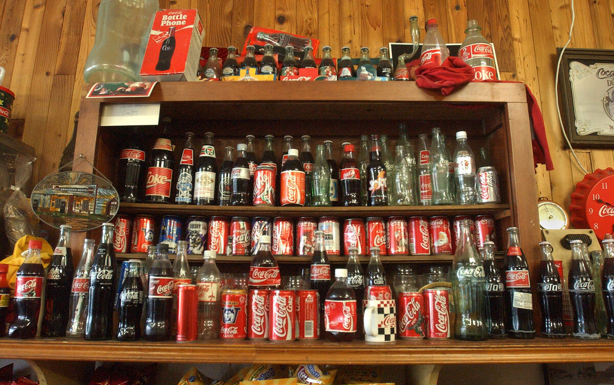 Coke souvenir products around the world on display at Don’s Ruston Market & Deli.