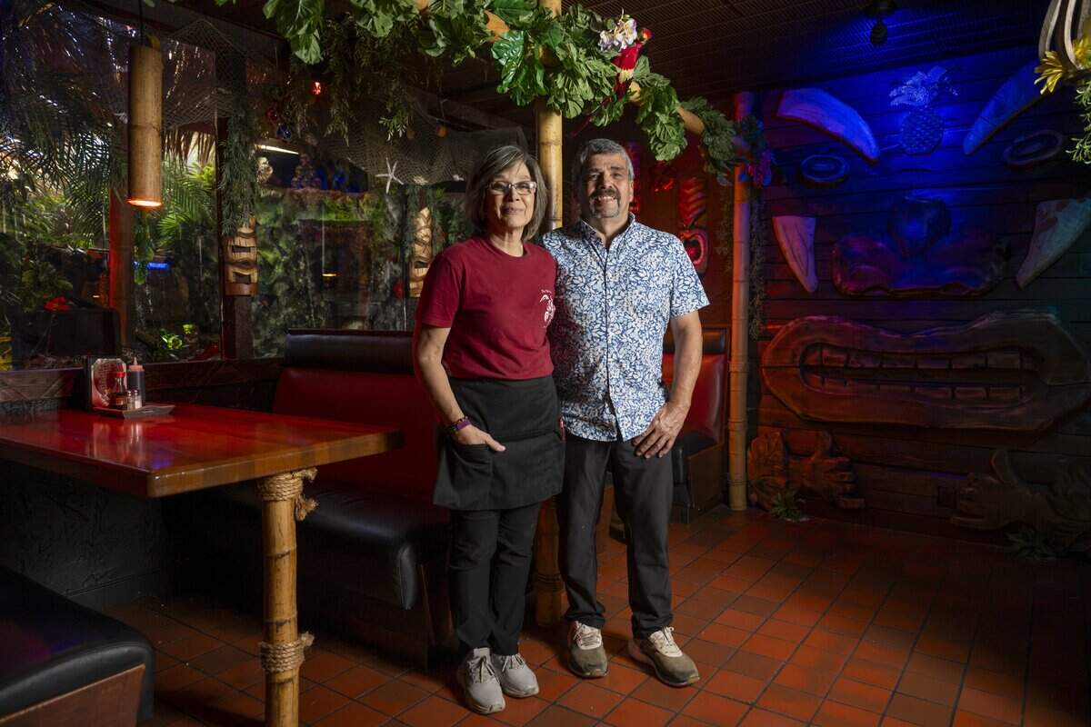 Owners Steve and Tamara Lerma stand for a portrait in the dining room of Da Tiki Hut on Thursday, July 9, 2026, in Tacoma, Wash.