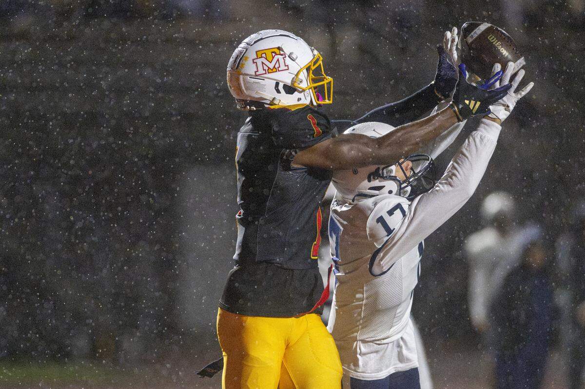 A pass intended for Mount Tahoma’s Elijah Durr (1) in the end zone is blocked by Bellarmine’s Hunter Goodsell (17) on Friday, Oct. 10, 2025, at Mount Tahoma in Tacoma, Wash.