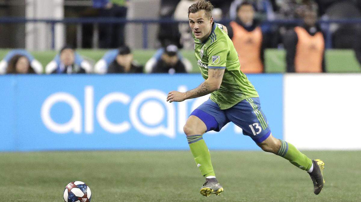 Seattle Sounders forward Jordan Morris moves the ball against FC Cincinnati during the second half of an MLS soccer match, Saturday, March 2, 2019, in Seattle. The Sounders won 4-1. (AP Photo/Ted S. Warren)