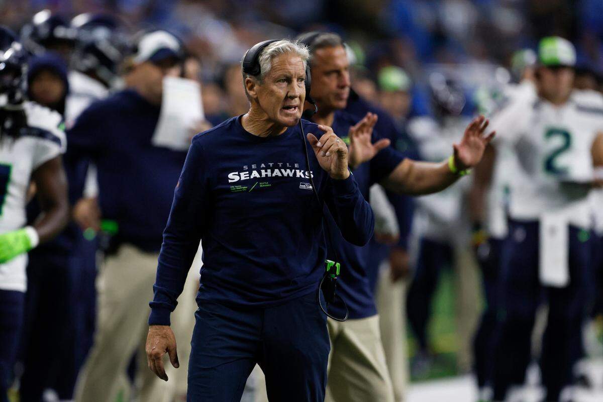 Seattle Seahawks head coach Pete Carroll watches from the sideline during the first half of an NFL football game against the Detroit Lions, Sunday, Sept. 17, 2023, in Detroit. (AP Photo/Duane Burleson)