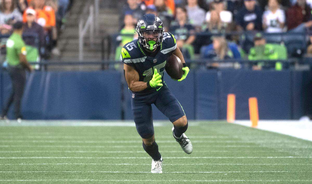 Seahawks wide receiver John Ursua heads up field after making a catch during Saturday night’s NFL preseason football game against the Denver Broncos at Lumen Field in Seattle, Washington, on Saturday, Aug. 21, 2021.