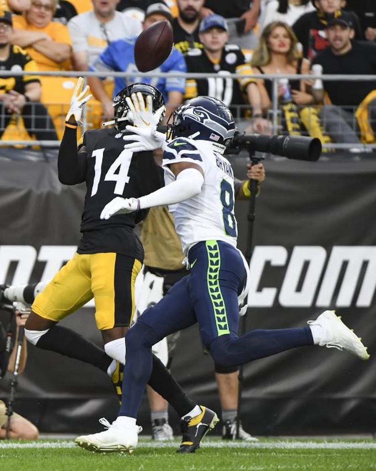 Rookie cornerback Coby Bryant didn’t do what he’s been doing all training camp -- get his head turned around to the ball -- on this touchdown catch by Pittsburgh’s George Pickens (14) in the first quarter of the Seahawks’ preseason loss to the Steelers on Aug. 13, 2022.