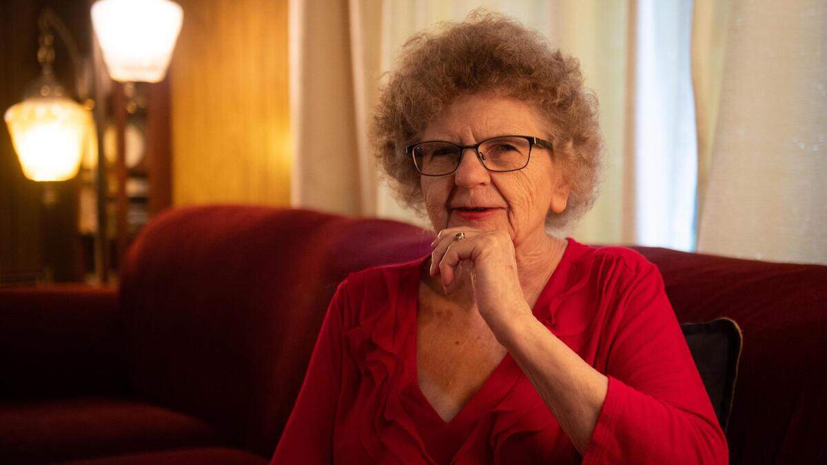Joanne Kingsbury in her home at Gig Harbor on Sunday. She’s 84, but because she was born on Feb. 29, she will be celebrating her “21st birthday” on Saturday.