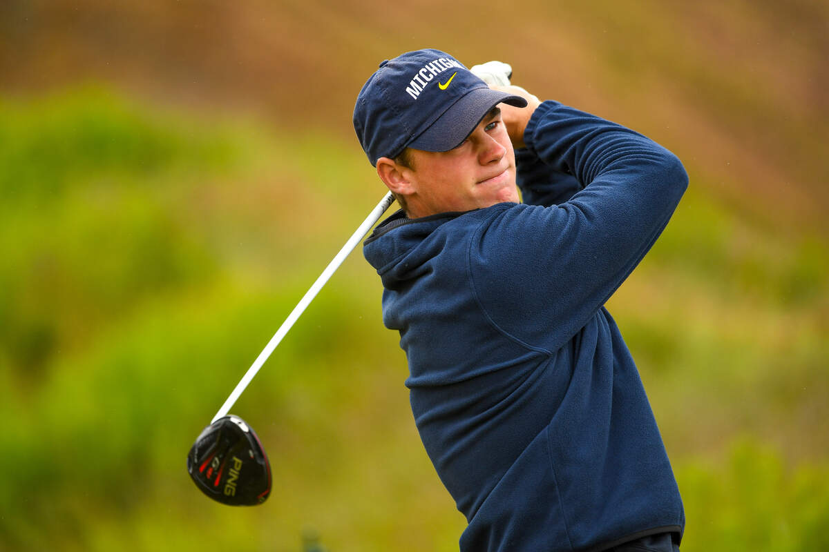 Patrick Sullivan plays his tee shot at the first hole during the round of 32 at the 2021 U.S. Amateur Four-Ball at Chambers Bay in University Place, Wash. on Monday, May 24, 2021. (Robert Beck/USGA)