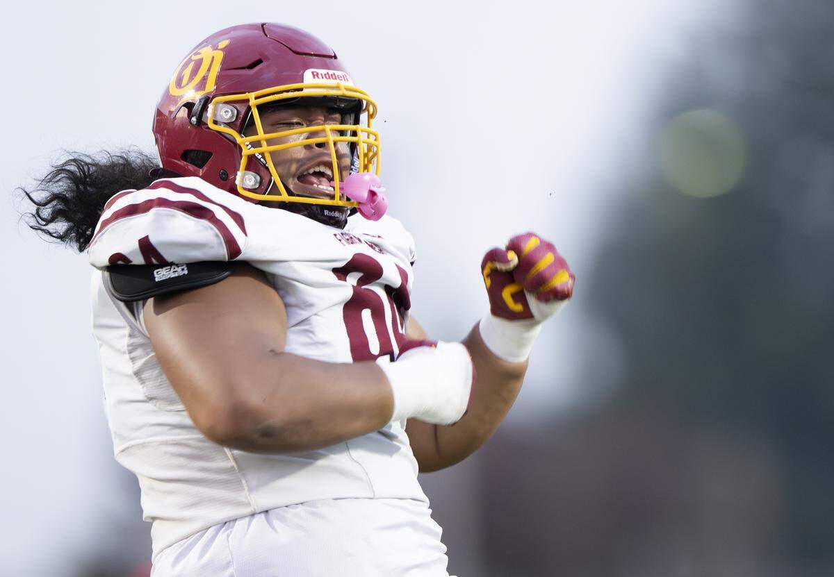 O'Dea Fighting Irish defensive lineman Jeremiah Nonu (64) reacts to play against the Graham-Kapowsin Eagles during the first half of the game at Art Crate Field, on Friday, Sept. 5, 2025, in Spanaway, Wash.