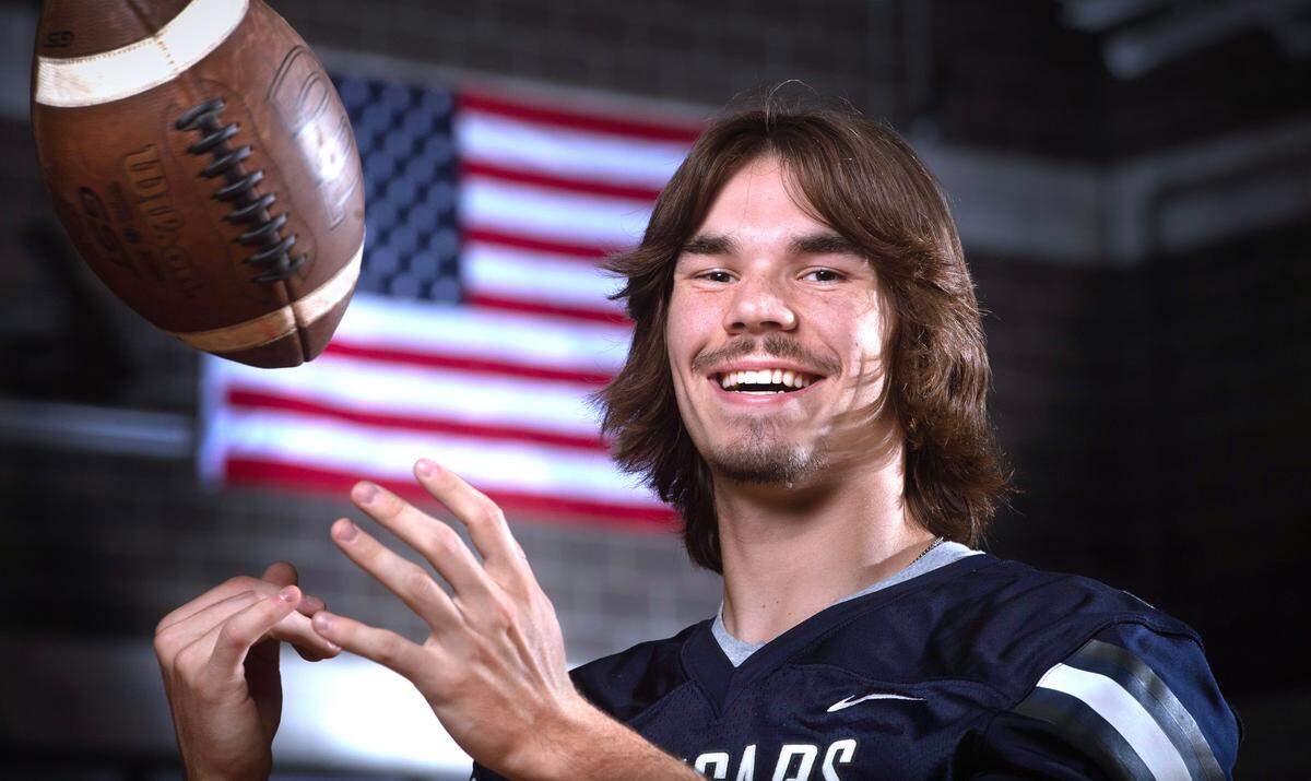 Cascade Christian senior quarterback Jackson Almond is leading the Cougars to an impressive season. He is shown at Cascade Christian High School in Puyallup, Washington, on Wednesday, Oct. 11, 2023.