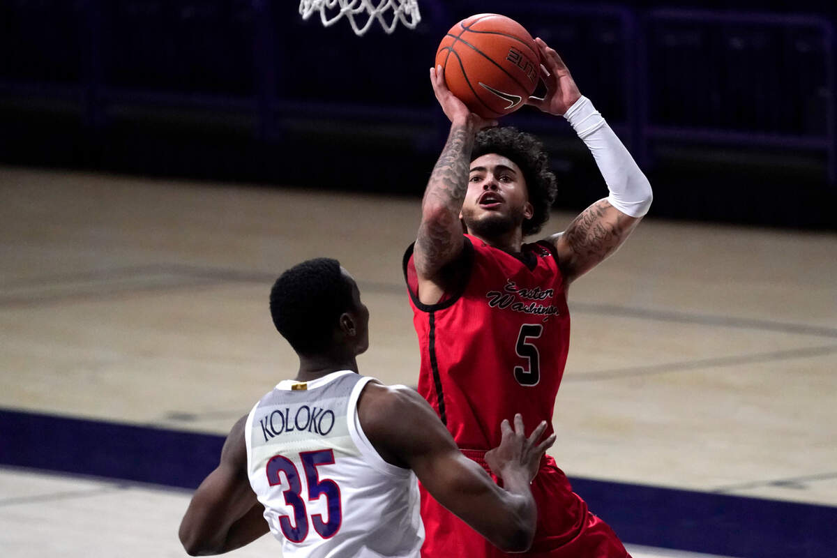 Eastern Washington guard Casson Rouse shoots over Arizona center Christian Koloko (35) during the second half of an NCAA college basketball game, Saturday, Dec. 5, 2020, in Tucson, Ariz. (AP Photo/Rick Scuteri)