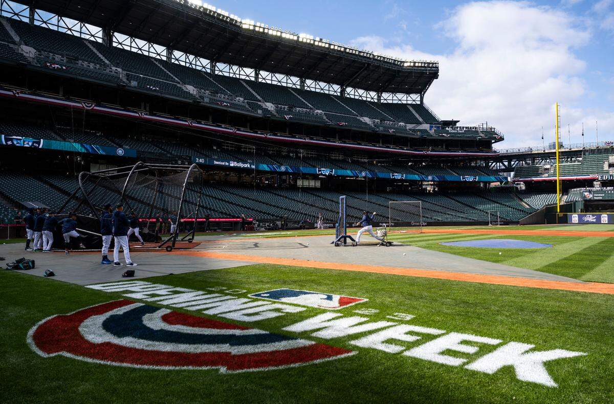 Mariners players hit during batting practice before the start of their home opener against the Cleveland Guardians at T-Mobile Park in Seattle on Thursday, March 30, 2023.