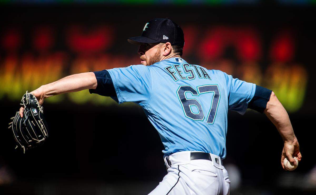 Matt Festa pitches during the game. The Seattle Mariners played the San Diego Padres in a exhibition baseball game at T-Mobile Park in Seattle, Wash., on Tuesday, March 26, 2019. 