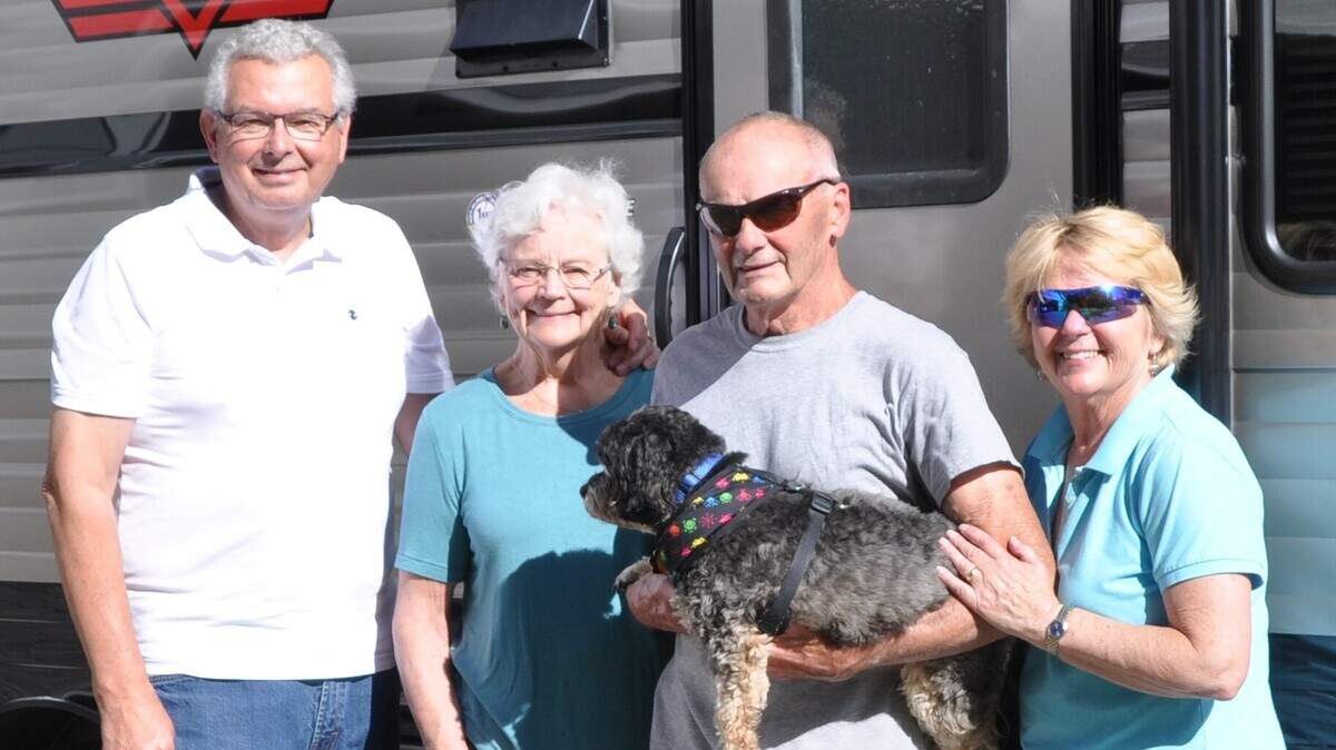 Reunited after decades apart are, from left, Dan Stromstad, Gail Stromstad, Paul Linnimen, Peggy Linnimen and their pet Lily.