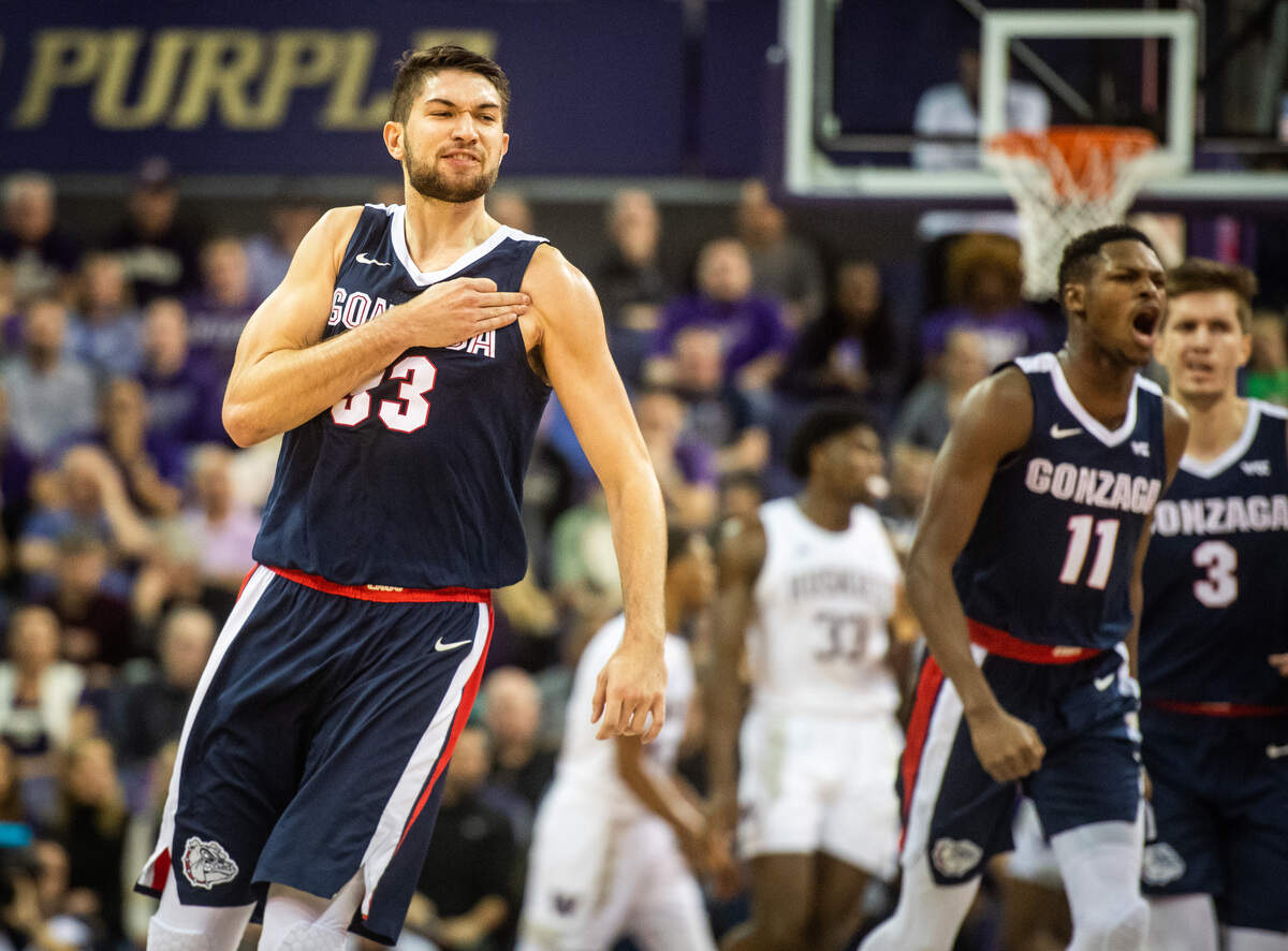 Gonzaga Bulldogs forward Killian Tillie (33) celebrates after a three-point-shot during the first half. The Washington Huskies played the Gonzaga Bulldogs in a NCAA basketball game at Her Edmundson Pavilion in Seattle, Wash., on Sunday, Dec. 8, 2019.